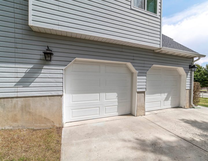 newly added garage of a renovated home