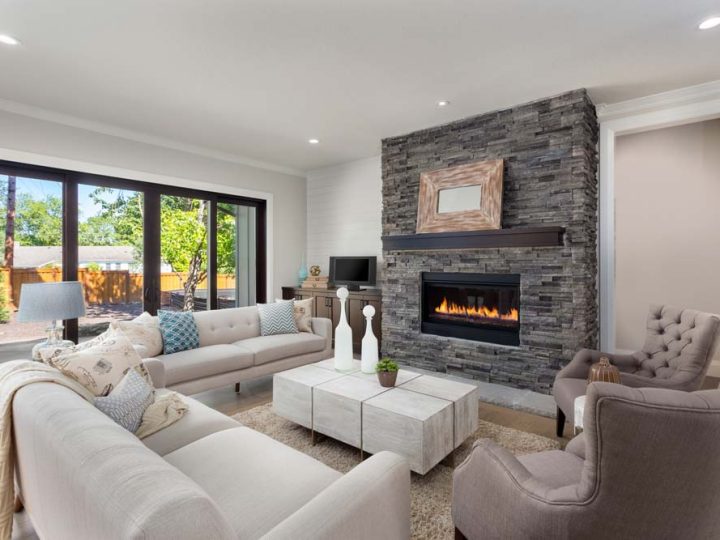 furnished living room in newly constructed luxury home