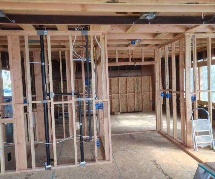 interior wood frame with electrical wiring and pipes preparation