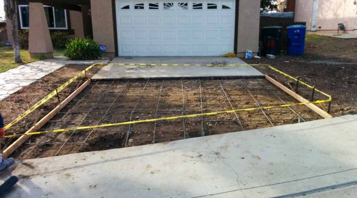 ground preparation of the driveway for concrete pouring, leveled out driveway sub-base